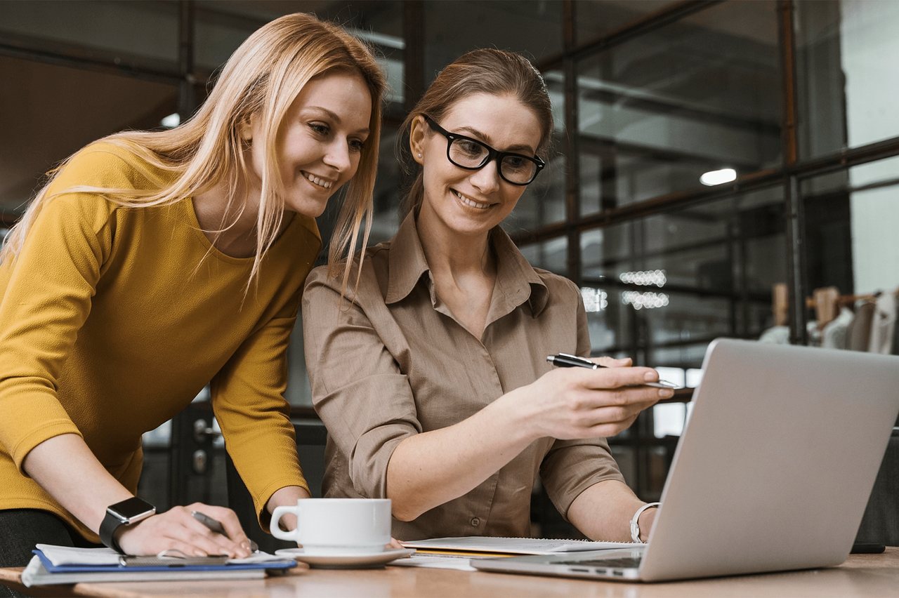 A human resources team reviewing applications together