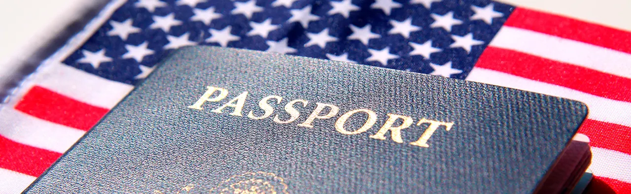A U.S. passport resting on an American flag