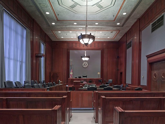 What Happens at an Individual Hearing in Immigration Court? - empty courtroom wooden benches